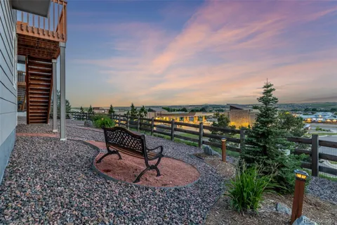 a view of a terrace with sitting area