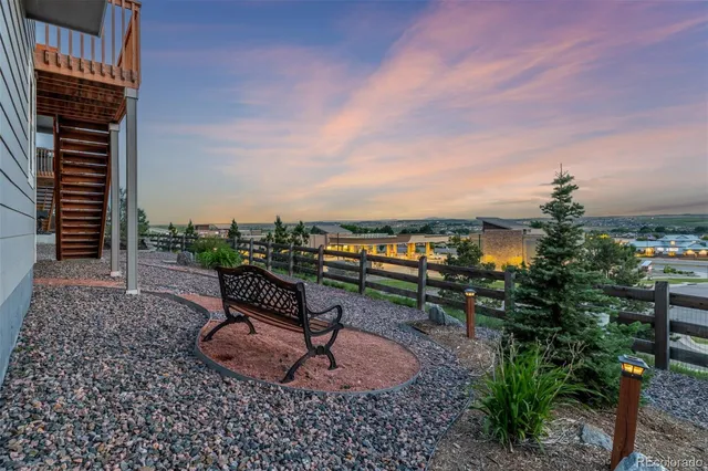 a view of a terrace with sitting area