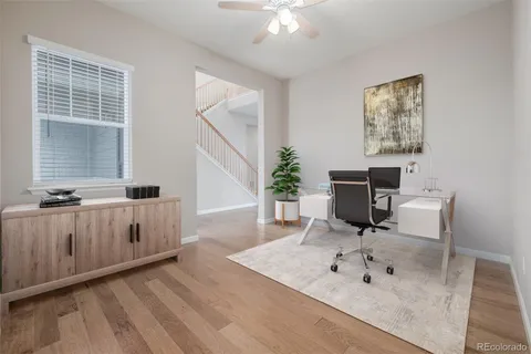 a spacious bathroom with a double vanity sink and a mirror