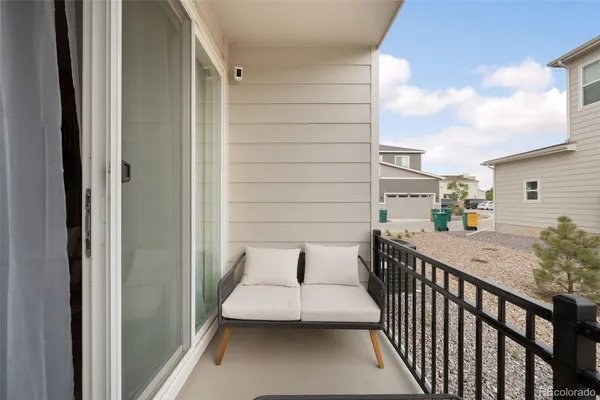 a balcony view with a couch