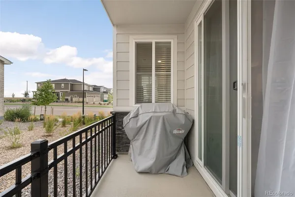a view of balcony with furniture