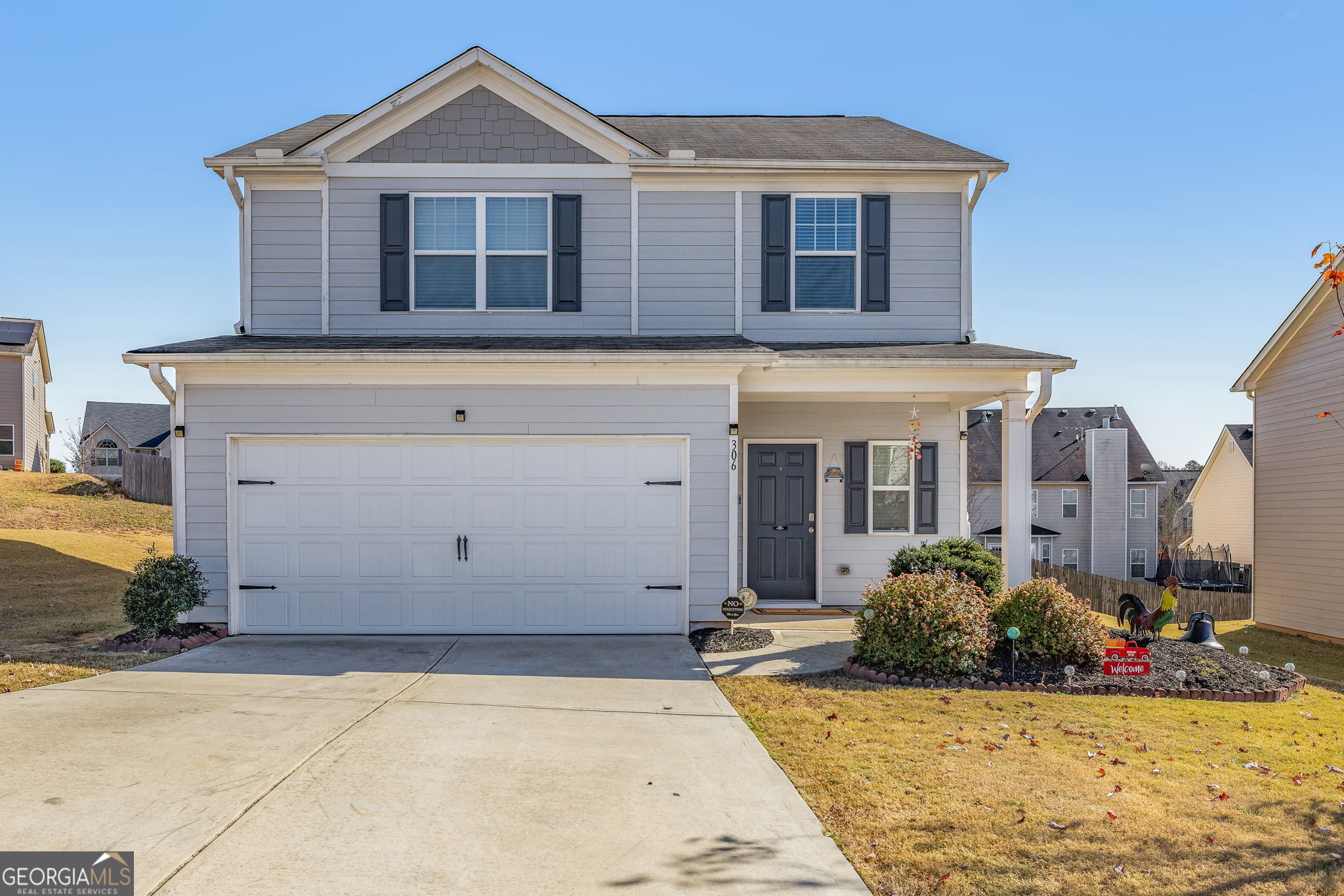 306 Seasons Valley Pendergrass, GA 30567 - Photo 1 of 1 a front view of a house with a yard