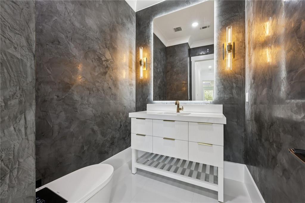 2395 Kilgore Road Buford, GA 30519 - Photo 23 of 68 a bathroom with a sink and a mirror