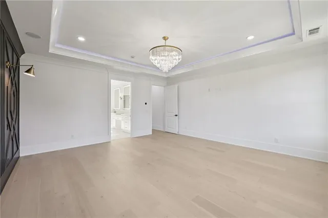 a white bath tub sitting in a bathroom