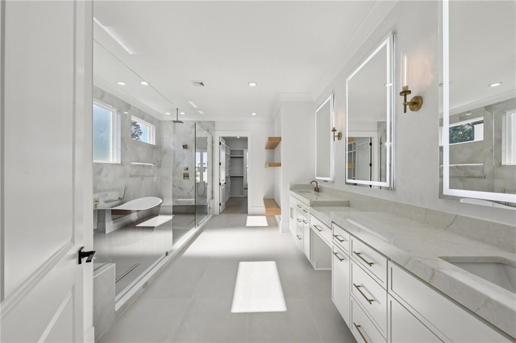 2395 Kilgore Road Buford, GA 30519 - Photo 28 of 68 a large white kitchen with a large window