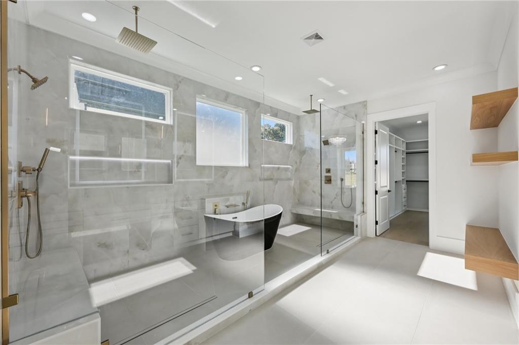 2395 Kilgore Road Buford, GA 30519 - Photo 30 of 68 a spacious bathroom with a shower and a toilet
