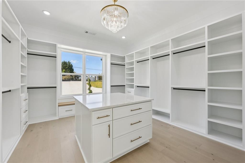 2395 Kilgore Road Buford, GA 30519 - Photo 32 of 68 a kitchen with a refrigerator and a sink
