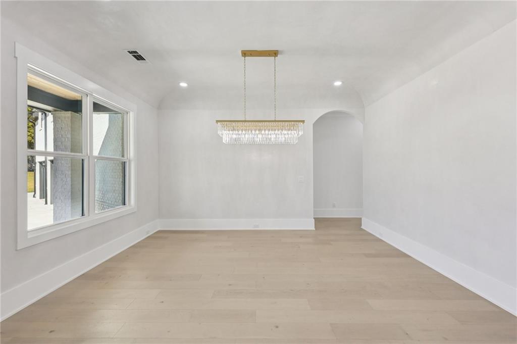 2395 Kilgore Road Buford, GA 30519 - Photo 6 of 68 a view of an empty room with a window