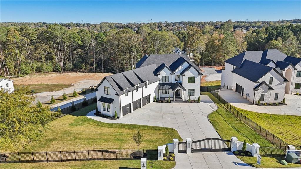 2395 Kilgore Road Buford, GA 30519 - Photo 63 of 68 a view of a swimming pool with lounge chairs