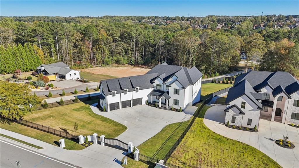 2395 Kilgore Road Buford, GA 30519 - Photo 67 of 68 a view of a swimming pool with a patio