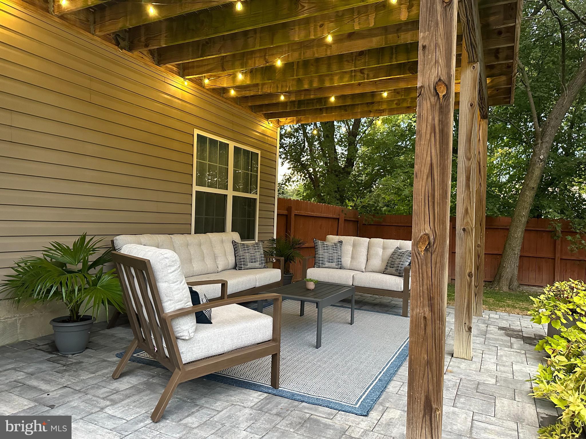 1221 Cox Neck Road Chester, MD 21619 - Photo 30 of 35 a outdoor living space with furniture and garden view