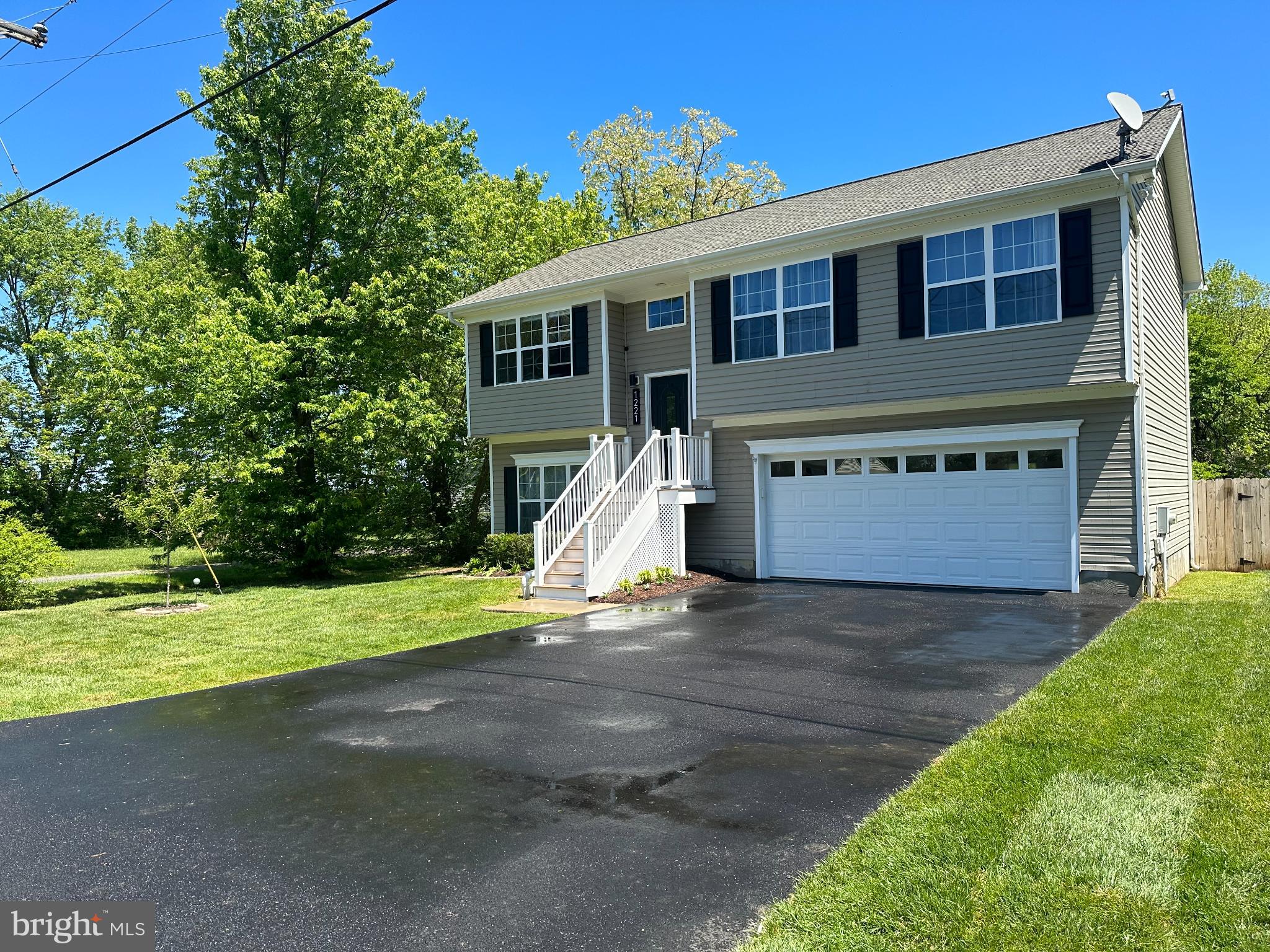 1221 Cox Neck Road Chester, MD 21619 - Photo 33 of 35 a view of a house with backyard and a tree