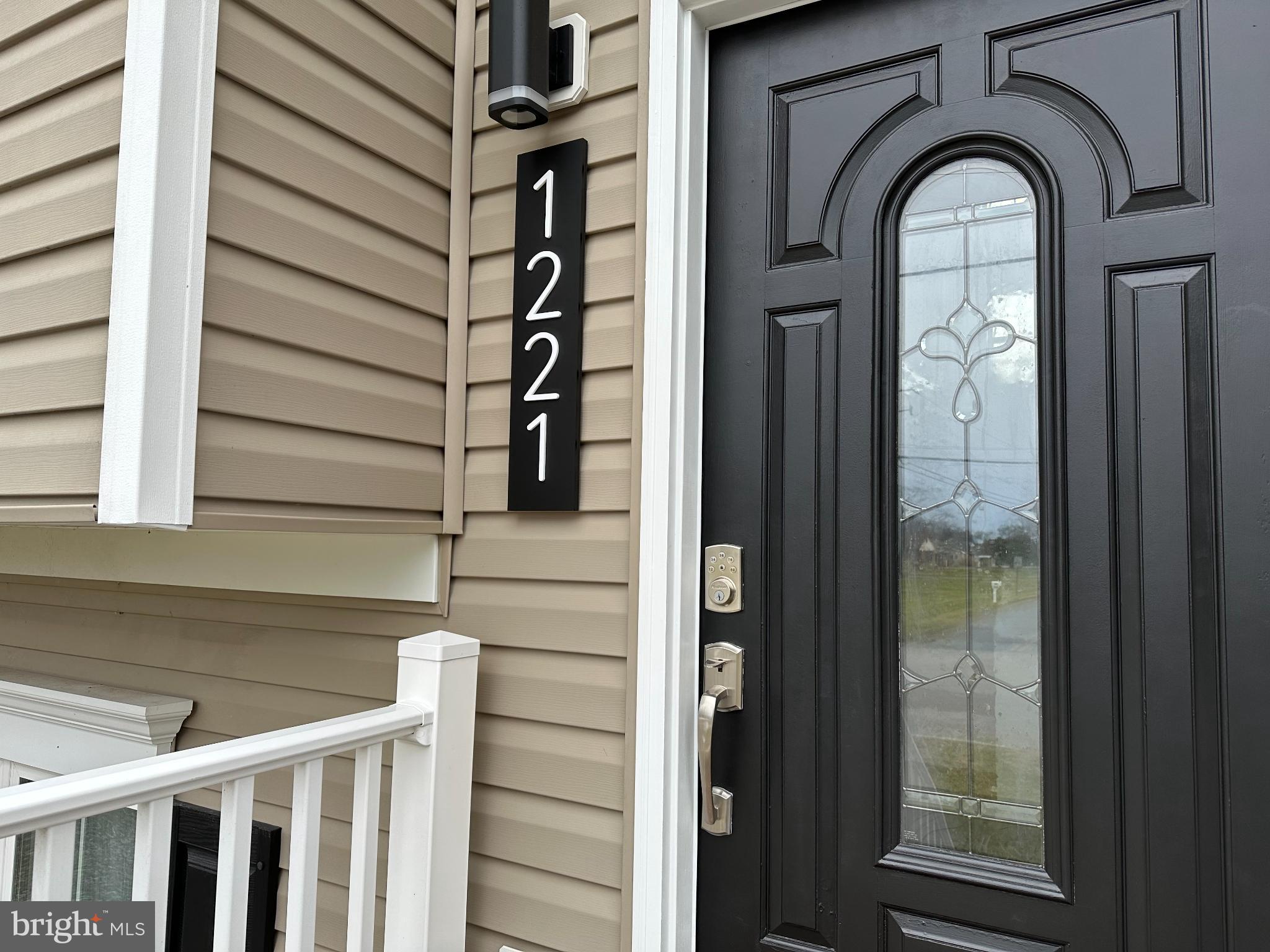 1221 Cox Neck Road Chester, MD 21619 - Photo 35 of 35 a view of a entryway door of the house