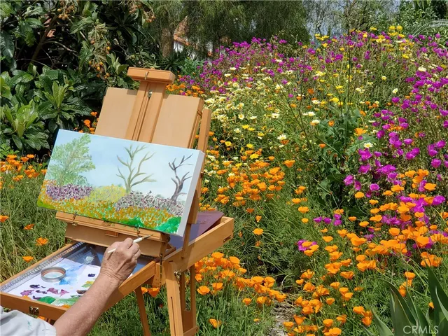 a kitchen with granite countertop a stove and a sink