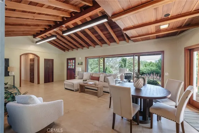 a bedroom with a bed and a potted plant