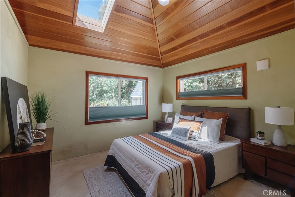 2 Chuckwagon Road Rolling Hills, CA 90274 - Photo 32 of 76 a bedroom with a bed and a flat screen tv