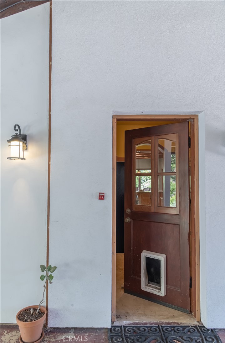 2 Chuckwagon Road Rolling Hills, CA 90274 - Photo 35 of 76 a front view of a house with entryway