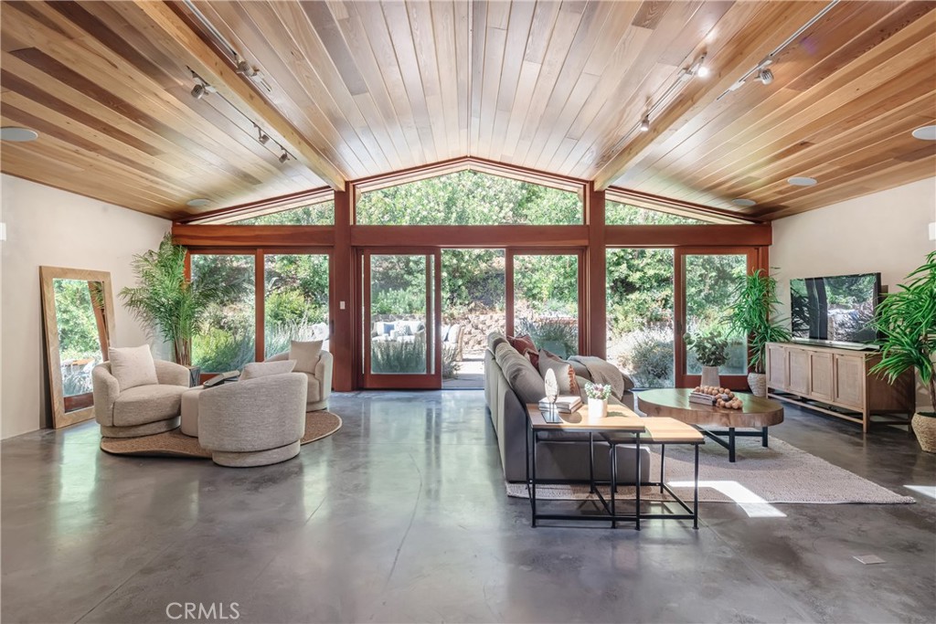 2 Chuckwagon Road Rolling Hills, CA 90274 - Photo 3 of 76 a living room with furniture and a large window