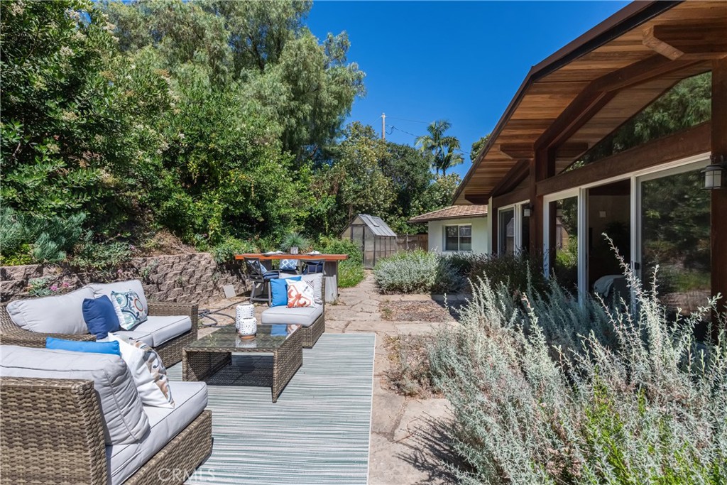 2 Chuckwagon Road Rolling Hills, CA 90274 - Photo 4 of 76 a view of backyard with seating space and trees