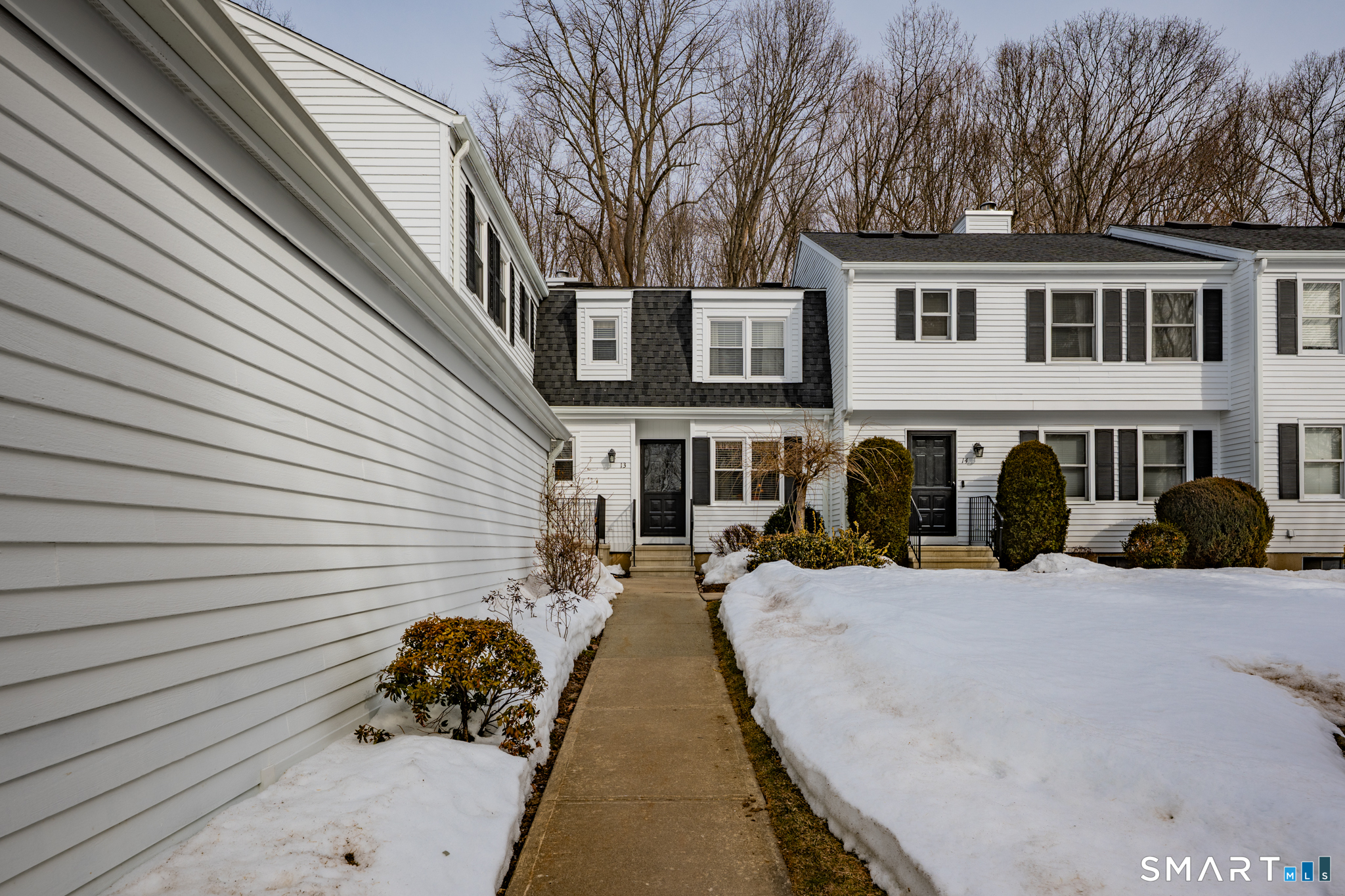 319 Thomaston Road, Unit 13 Watertown, CT 06795 - Photo 2 of 30 a view of a patio with a yard