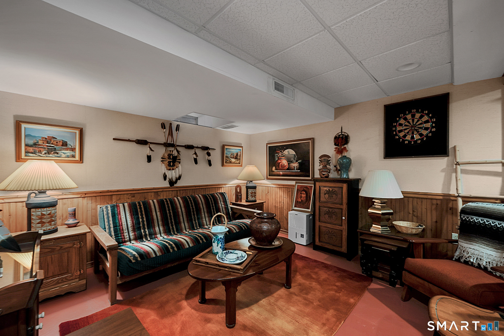 319 Thomaston Road, Unit 13 Watertown, CT 06795 - Photo 21 of 30 a living room with furniture and a flat screen tv