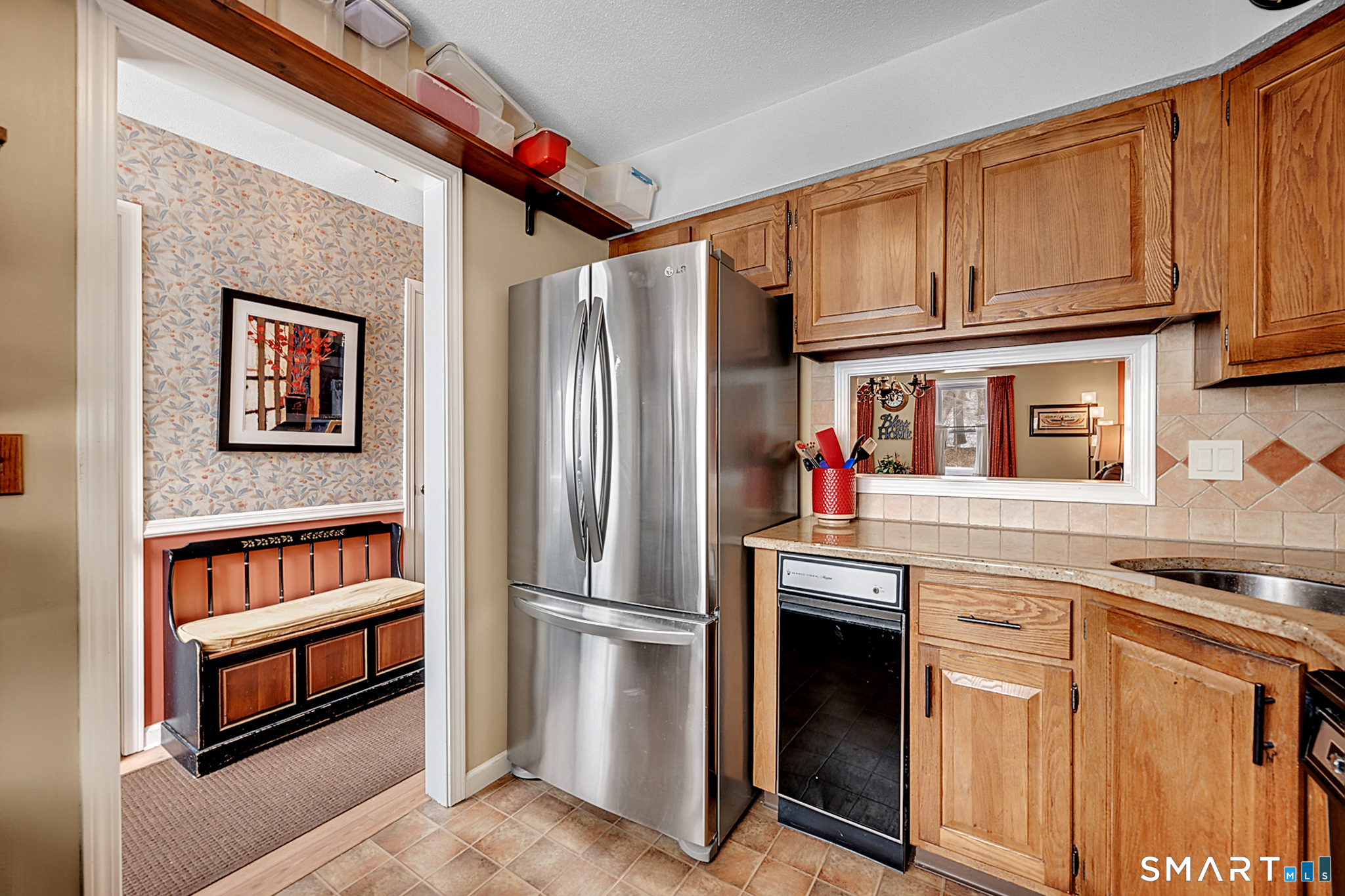 319 Thomaston Road, Unit 13 Watertown, CT 06795 - Photo 6 of 30 a kitchen with stainless steel appliances granite countertop a refrigerator and a stove top oven