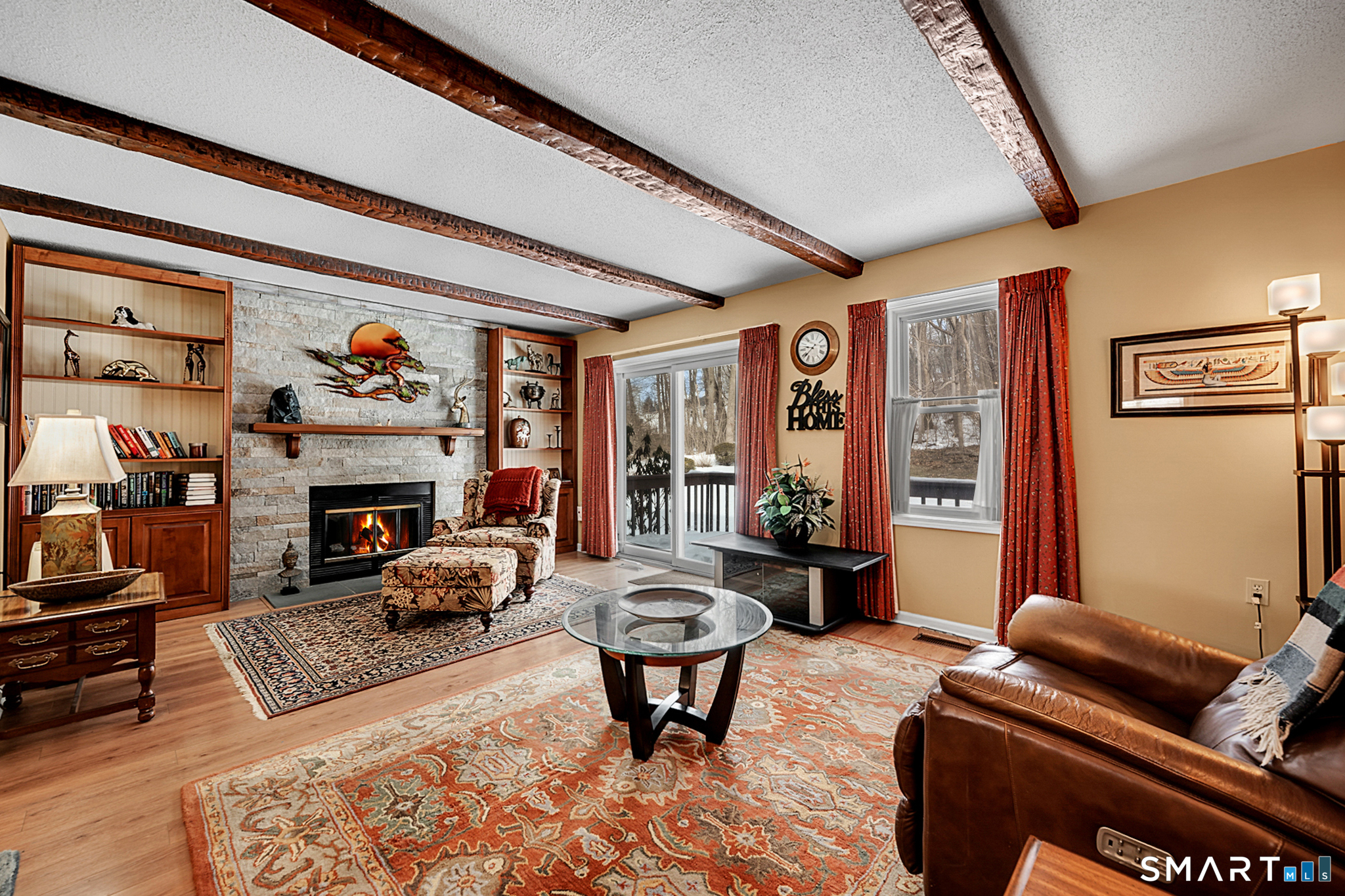 319 Thomaston Road, Unit 13 Watertown, CT 06795 - Photo 8 of 30 a living room with furniture or couch and a fireplace