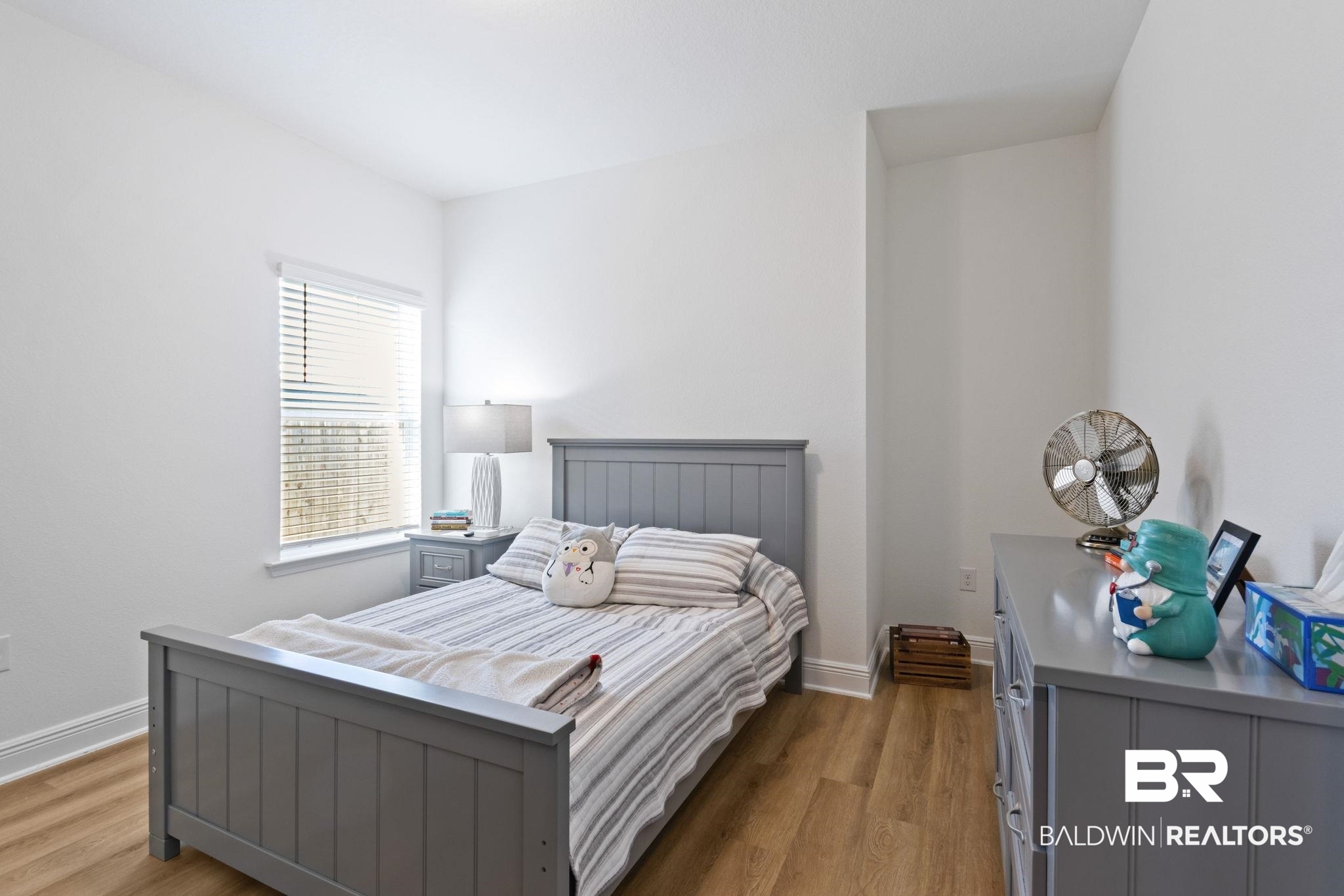 12919 Torrent Road Fairhope, AL 36532 - Photo 37 of 74 Bedroom with light wood-type flooring and baseboards
