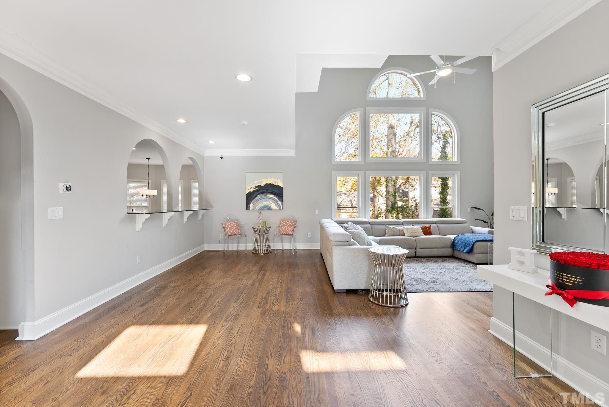 111 Redfern Drive Cary, NC 27518 - Photo 11 of 65 a living room with furniture and a large window