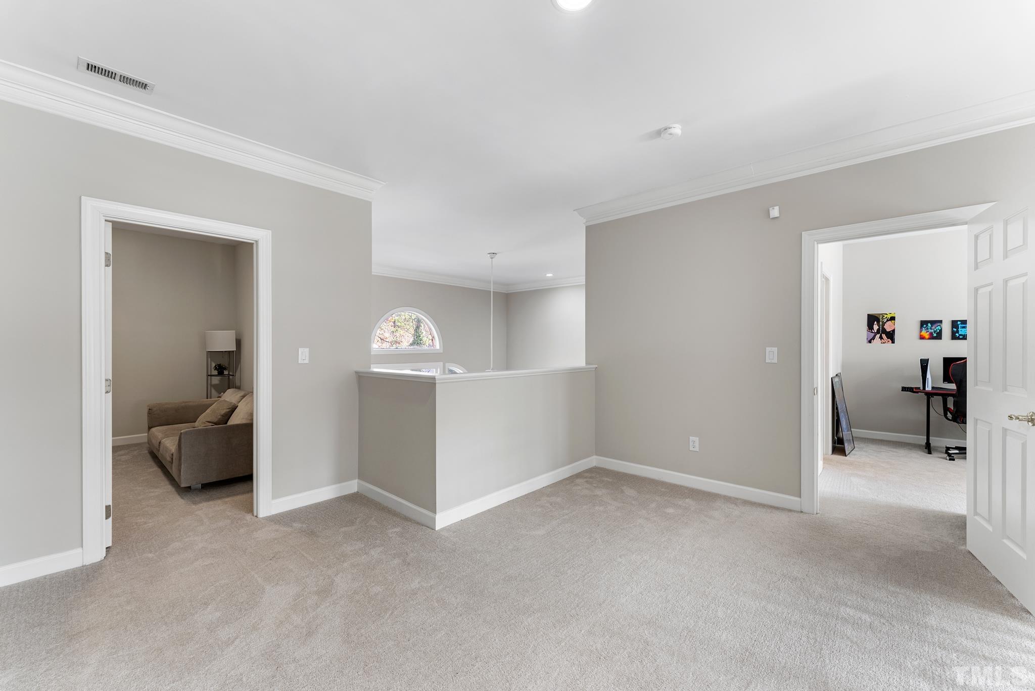 111 Redfern Drive Cary, NC 27518 - Photo 28 of 65 a view of a livingroom and a ocean