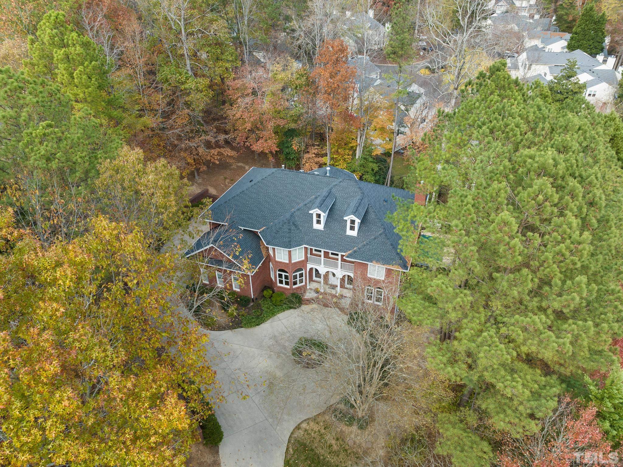111 Redfern Drive Cary, NC 27518 - Photo 4 of 65 view of a house with a yard