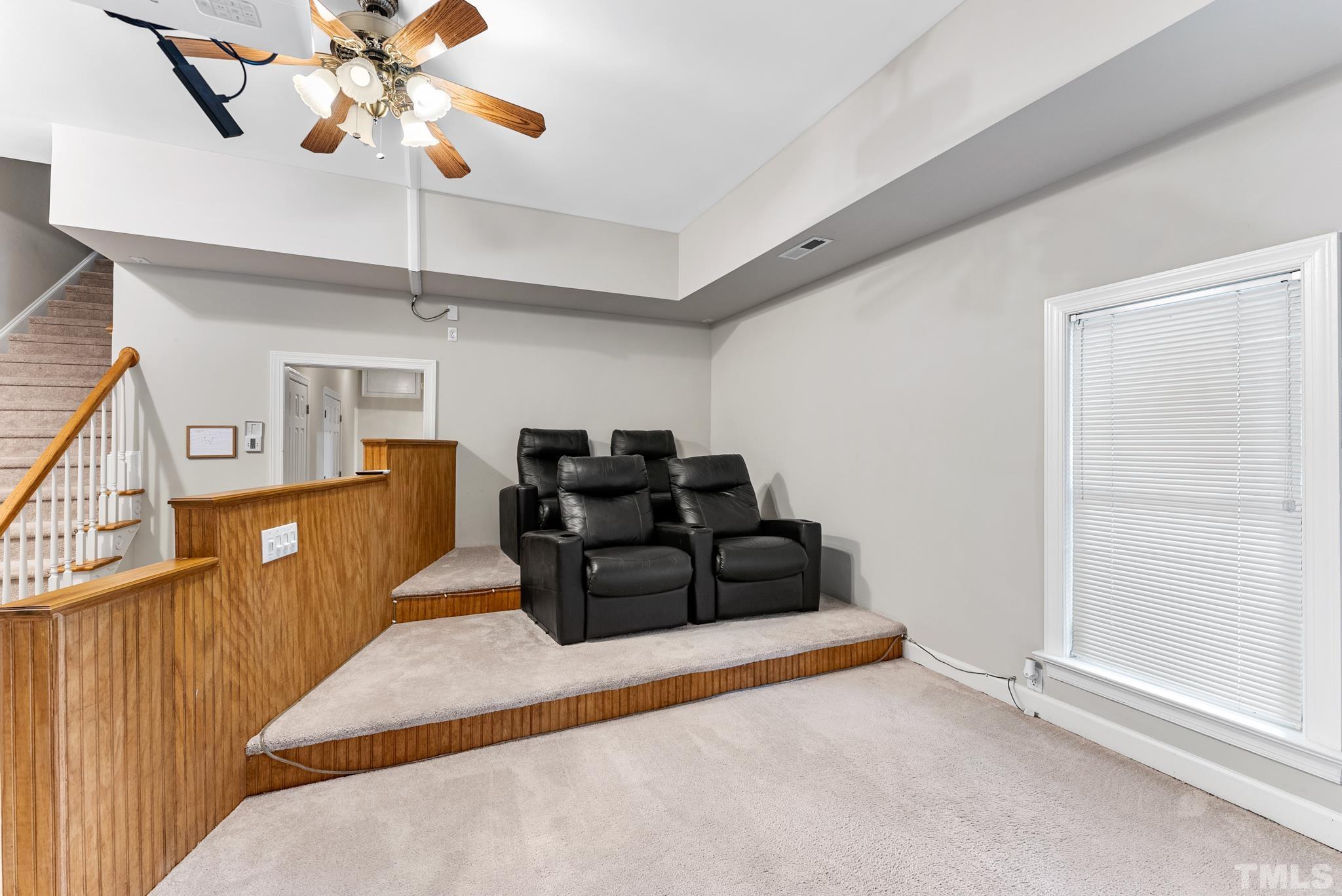 111 Redfern Drive Cary, NC 27518 - Photo 44 of 65 a living room with furniture and wooden floor