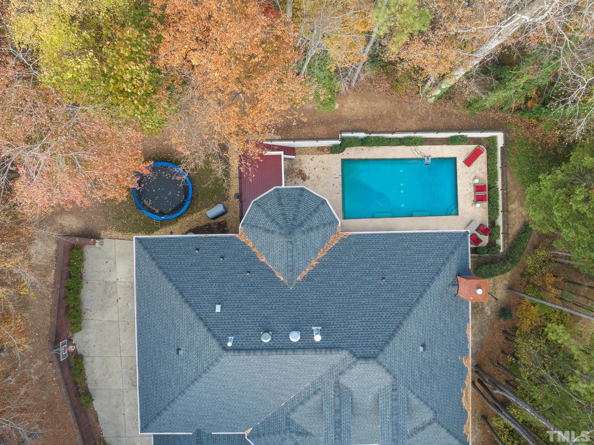 111 Redfern Drive Cary, NC 27518 - Photo 5 of 65 view of backyard with a sink and a stove