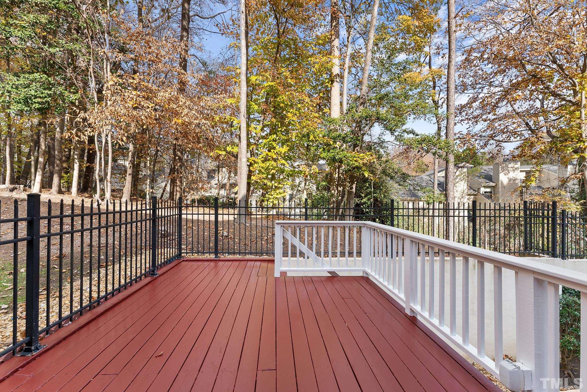 111 Redfern Drive Cary, NC 27518 - Photo 59 of 65 a view of a balcony with wooden floor