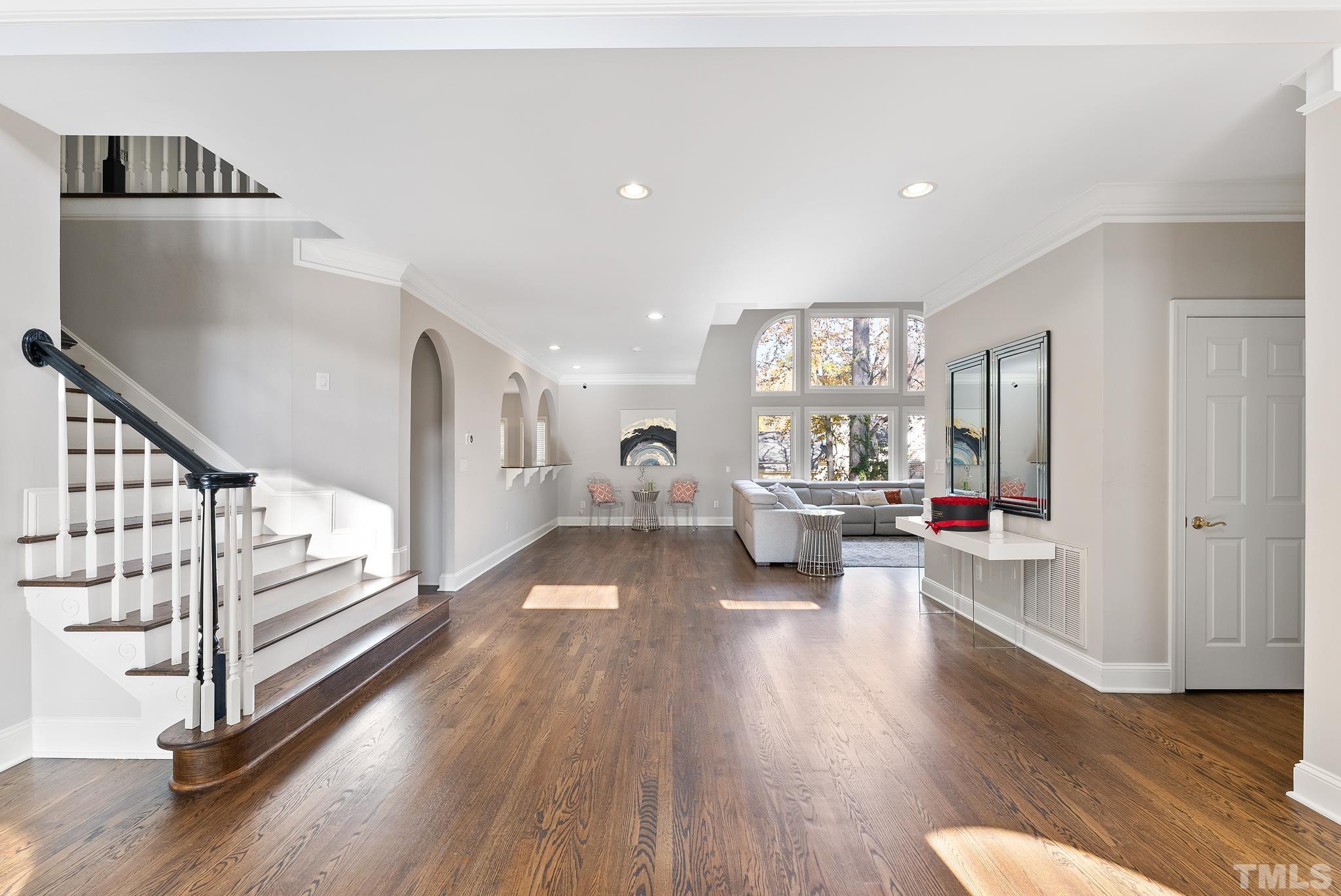 111 Redfern Drive Cary, NC 27518 - Photo 6 of 65 a living room with furniture and a wooden floor