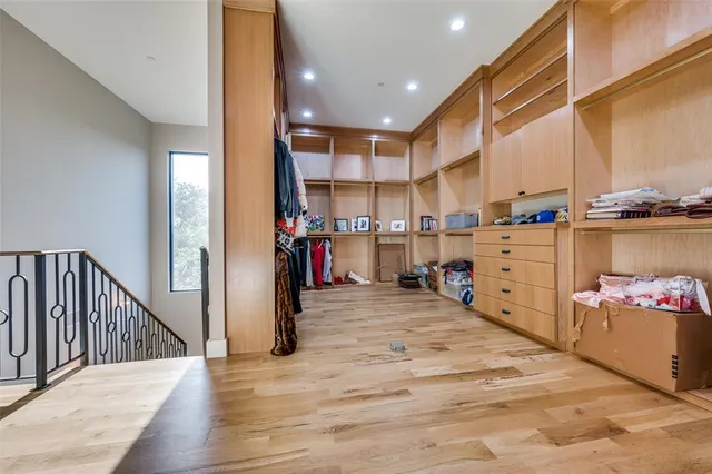 a view of a kitchen cabinets and wooden floor