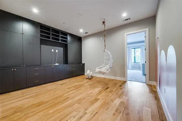 a view of a livingroom with wooden floor