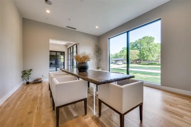 a very nice looking living room with a large window