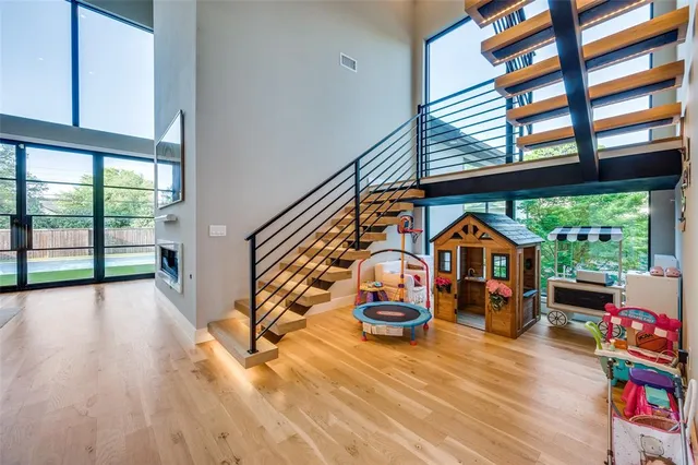 a view of living room with furniture and a large window
