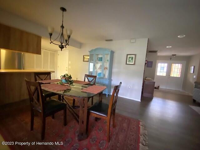 2671 Royal Ridge Drive Spring Hill, FL 34606 - Photo 11 of 34 a view of a dining room with furniture