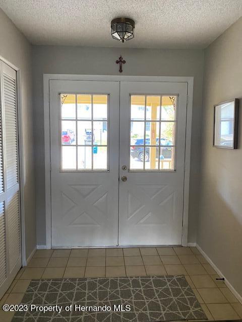 2671 Royal Ridge Drive Spring Hill, FL 34606 - Photo 3 of 34 a view of an empty room and window