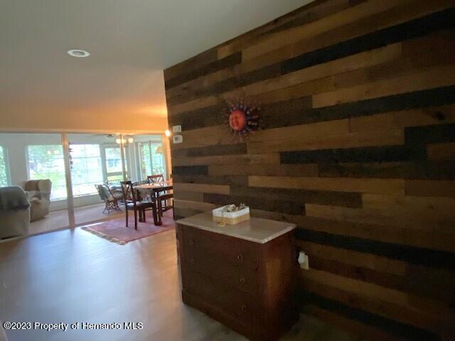 2671 Royal Ridge Drive Spring Hill, FL 34606 - Photo 5 of 34 a living room with furniture and wooden floor