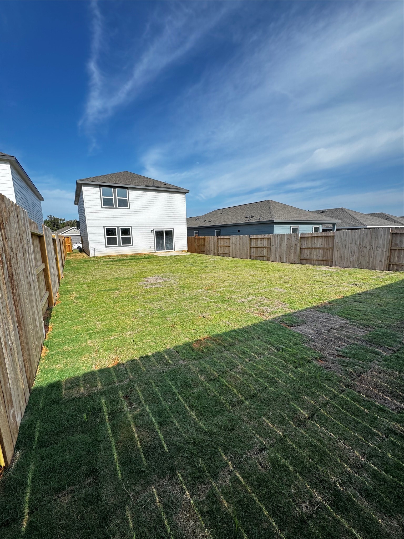 9436 Hard Rock Road Conroe, TX 77303 - Photo 12 of 12 a view of a big room with an empty space and a swimming pool