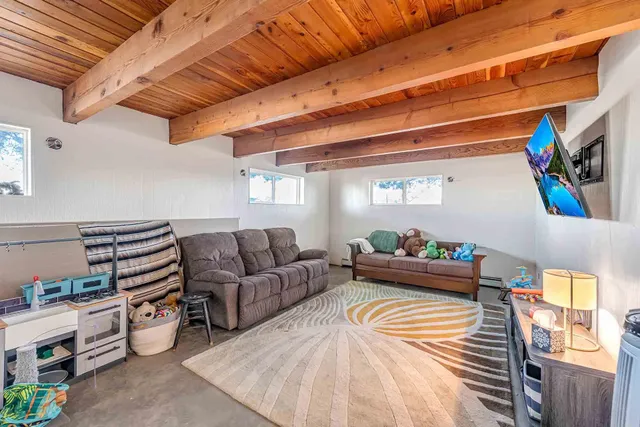 a bedroom with furniture and a bed