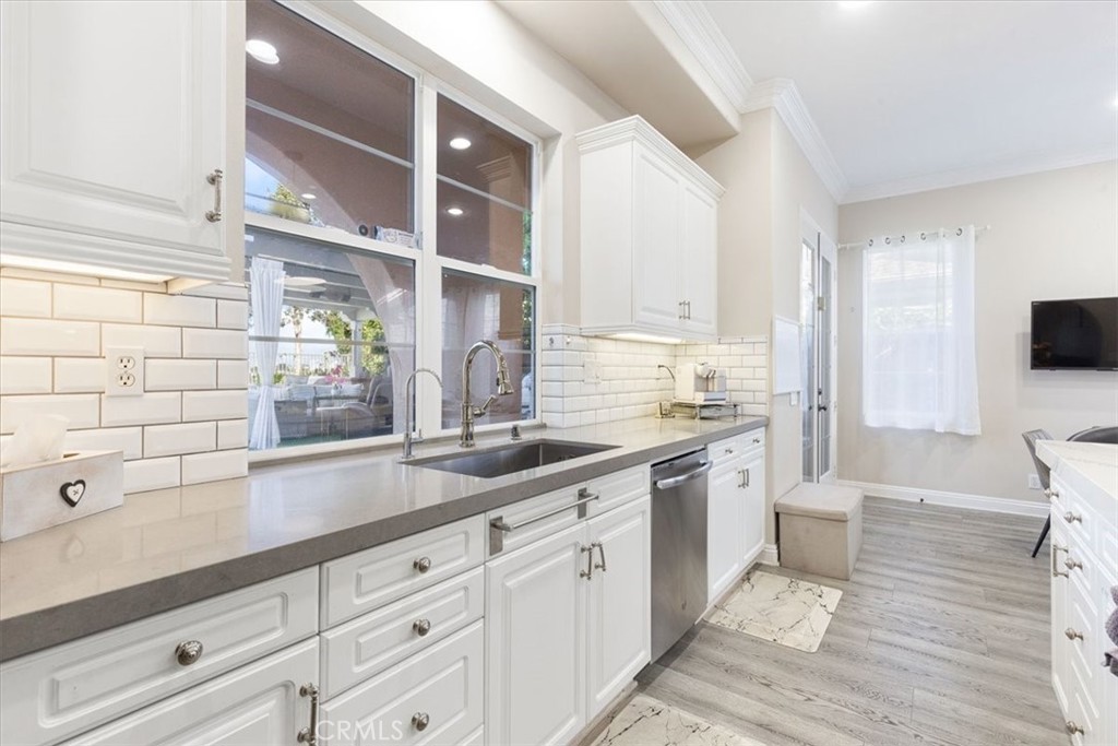 33 Craftsbury Place Ladera Ranch, CA 92694 - Photo 11 of 33 a spacious bathroom with a double vanity sink a mirror and a bathtub