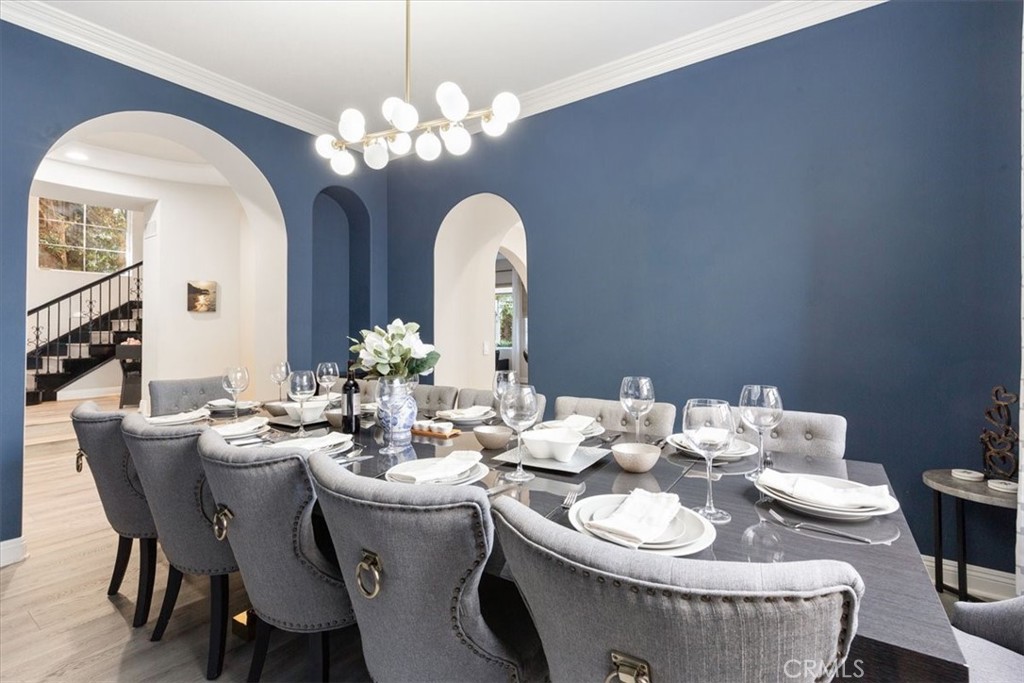 33 Craftsbury Place Ladera Ranch, CA 92694 - Photo 16 of 33 a dining room with furniture and a chandelier