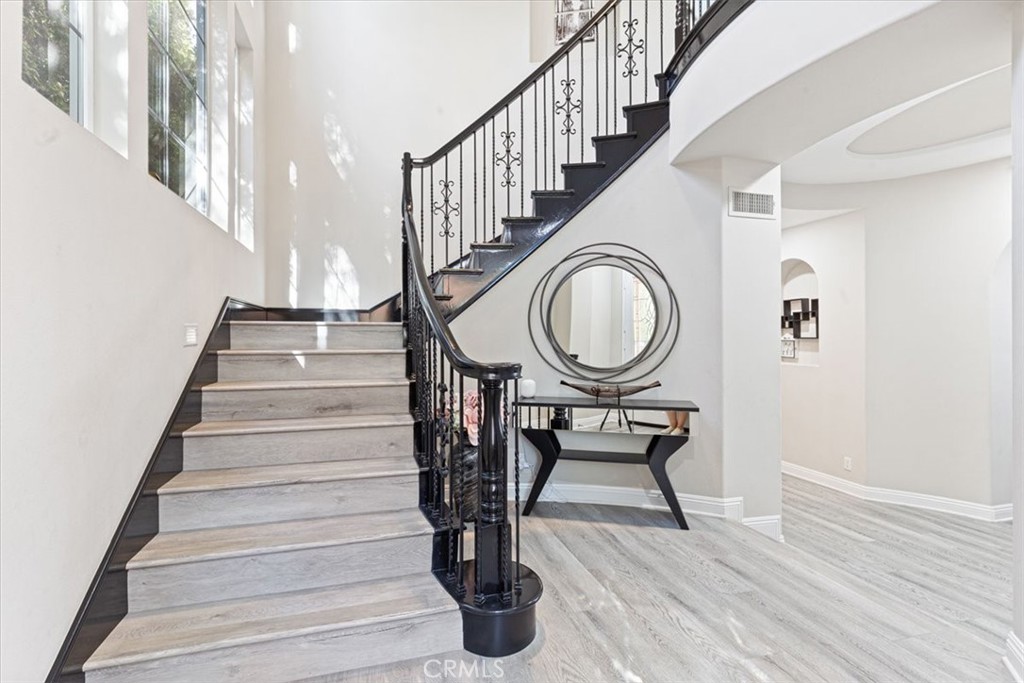 33 Craftsbury Place Ladera Ranch, CA 92694 - Photo 17 of 33 a view of entryway and hall with wooden floor