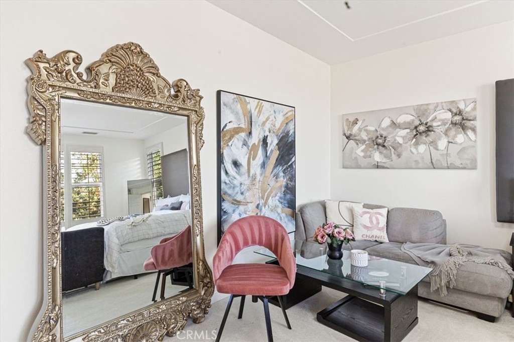 33 Craftsbury Place Ladera Ranch, CA 92694 - Photo 19 of 33 a living room with furniture and a large window