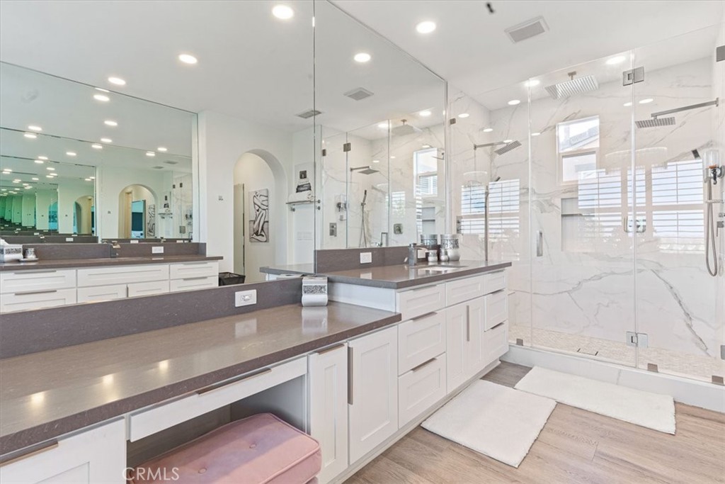 33 Craftsbury Place Ladera Ranch, CA 92694 - Photo 22 of 33 a large bathroom with a large tub sink and double vanity