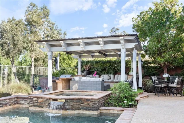 a view of house with yard outdoor seating and green space